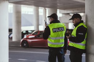 police-officers-in-black-uniforms-and-yellow-vests-2025-10-02-12-05-03-utc